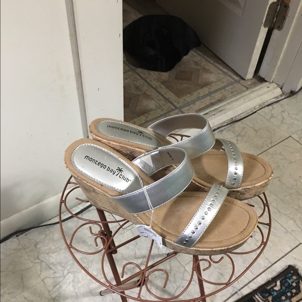 Silver wedge heel new never been worsen